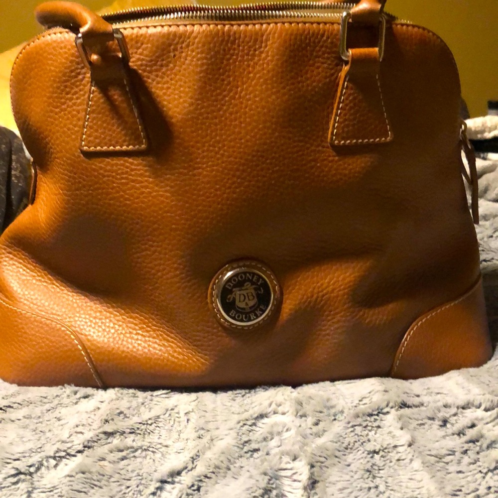 Brown Dooney and bourke leather purse. Excellent condition
